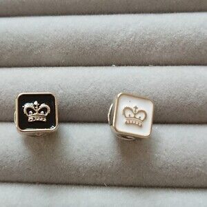 Black and white Crown brooch/pins
